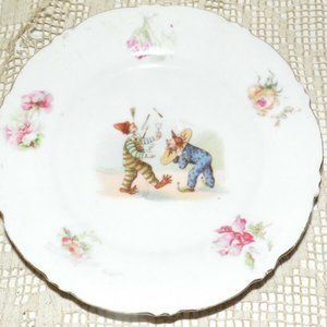 ANTIQUE PORCELAIN GERMANY CLOWNS DOING JUGGLING TRICKS LITHO FLORAL DESIGN PLATE